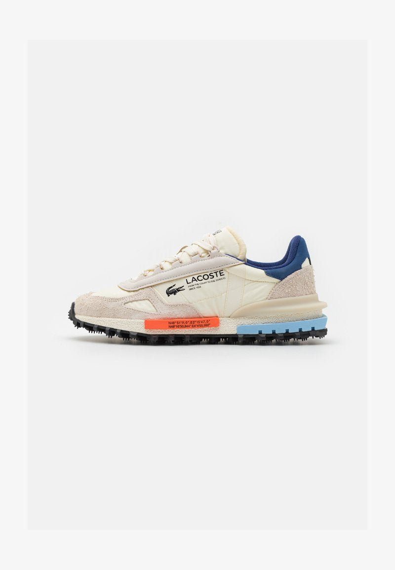 basket Lacoste Elite Active en coloris écru et marine