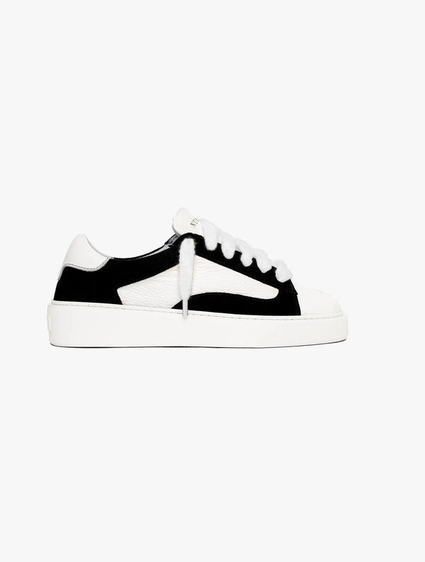 baskets Numeris Eclipse Jet en noir et blanc.