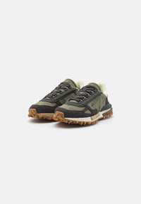 basket Lacoste Elite Active en coloris kaki et vert