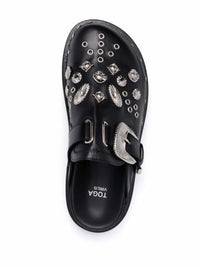 mules cloutées noires
