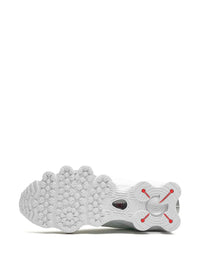 Nike Shox TL en blanc et argent métallisé