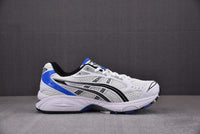 Asics Gel-Kayano 14 White with Black and Blue Accents.