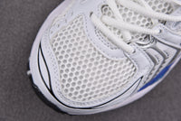Asics Gel-Kayano 14 White with Black and Blue Accents.