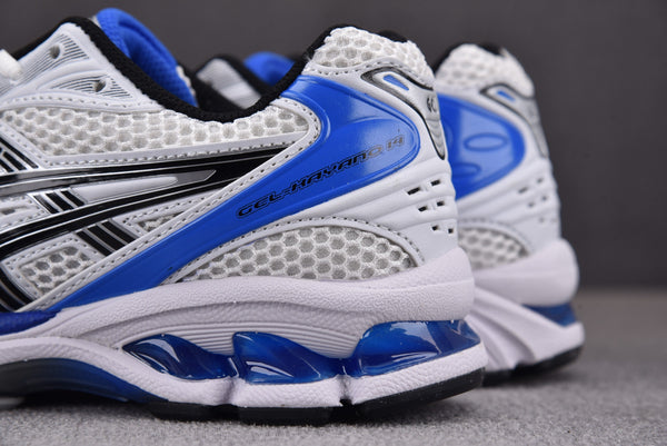 Asics Gel-Kayano 14 White with Black and Blue Accents.