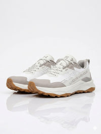 baskets Under Armour en coloris crème et gris