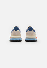 basket Lacoste Elite Active en coloris écru et marine