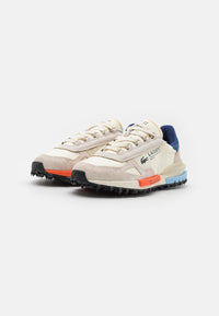 Basket Lacoste Elite Active en coloris écru et marine
