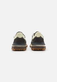 basket Lacoste Elite Active en coloris kaki et vert