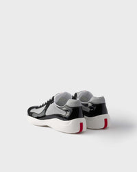 baskets Prada America’s Cup en cuir verni et tissu technique