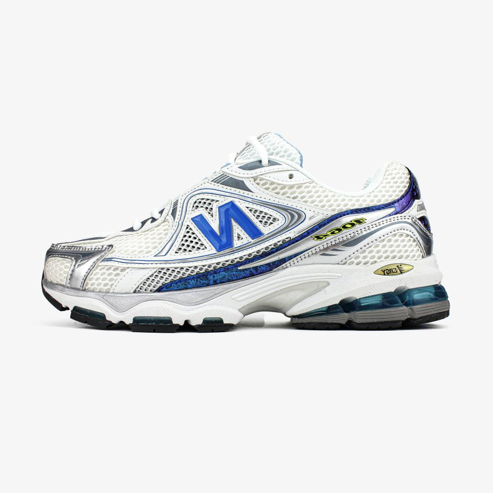 New Balance 1064 en coloris blanc, bleu et argent