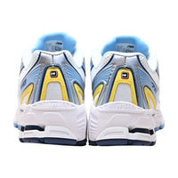 New Balance 740 blanc et bleu avec touches de jaune et d’argent