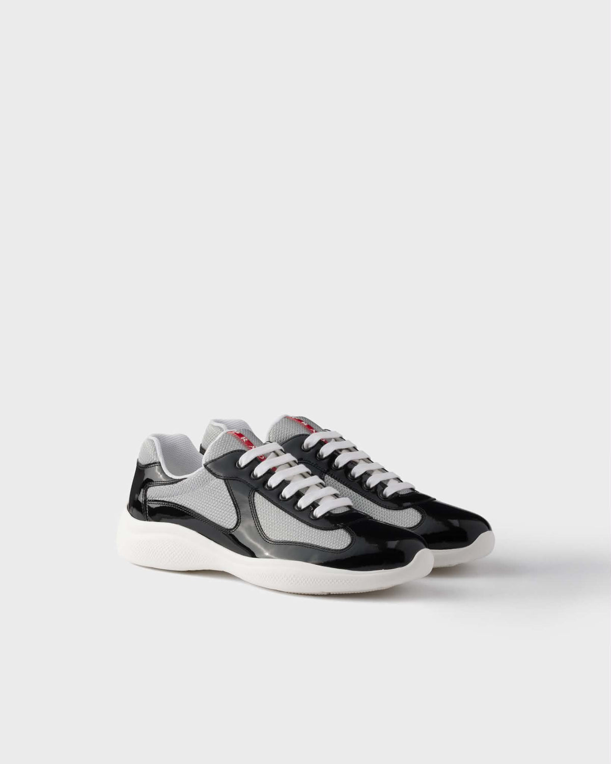 baskets Prada America’s Cup en cuir verni et tissu technique