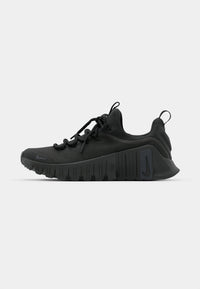 Basket Free Metcon 6 en coloris noir