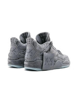 Sneaker AJ4 Retro Kaws