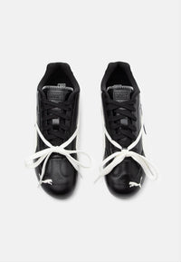 Puma Speedcat PRM x Rosé noir et blanc