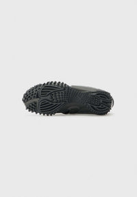 PUMA Mostro Perforated noire et blanche