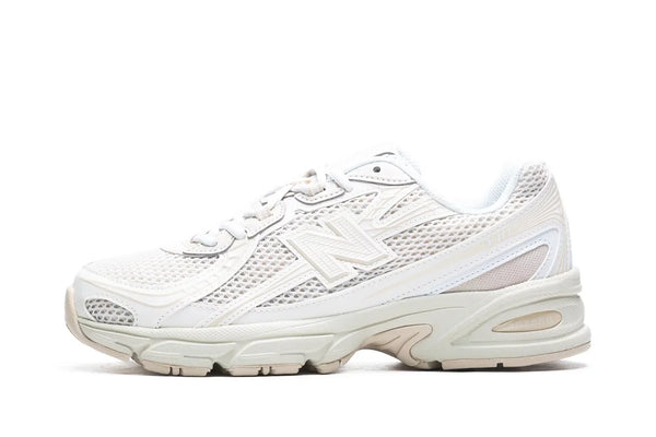 New Balance 740 en coloris blanc/argenté